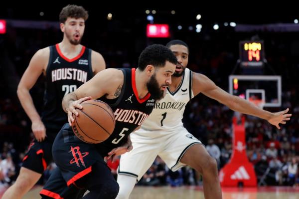 Fred VanVleet, who scored 21 points, drives around Mikal Bridgets during the Nets' loss.