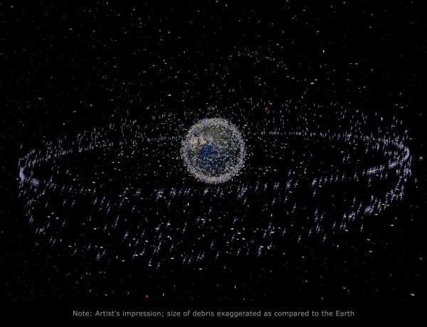 SPACE - UNDATED: This ESA image shows trackable objects in orbit around Earth. The number of objects in Earth orbit has increased steadily - by two hundred per year on average. Today, the number of catalogued objects is approx. 12,500. Note: The debris objects shown in the images are an artist's impression ba<em></em>sed on actual density data. However, the debris objects are shown at an eggagerated size to make them visible at the scale shown.  The amount of space junk orbiting earth has reached a 'tipping point' wher<em></em>e co<em></em>ntinual collisions are thickening the already dense cloud shrouding the Earth, a Nasa report has revealed. In practical terms, it means that the amount of junk floating around the planet will make it increasingly difficult for spacecraft to leave the planet, effectively trapping us on earth. It also poses 'potentially catastrophic risk' to astronauts, satellites and the Internatio<em></em>nal Space Station. 'We've lost co<em></em>ntrol of the environment,' said retired Nasa senior scientist Do<em></em>nald Kessler, who authored the report. There are 22,000 objects in orbit that are big enough for officials on the ground to track and countless more smaller o<em></em>nes that could do damage to human-carrying spaceships and valuable satellites. It is estimated that there are as may as 370,000 pieces of space junk floating in Earth's orbit, traveling at speeds of up to 22,000 mph.  PHOTOGRAPH BY ESA / Barcroft Media  UK Office, London. T +44 845 370 2233 W www.barcroftmedia.com  USA Office, New York City. T +1 212 564 8159 W www.barcroftusa.com  Indian Office, Delhi. T +91 11 4101 1726 W www.barcroftindia.com  Australasian & Pacific Rim Office, Melbourne. E info@barcroftpacific.com T +613 9510 3188 or +613 9510 0688 W www.barcroftpacific.com