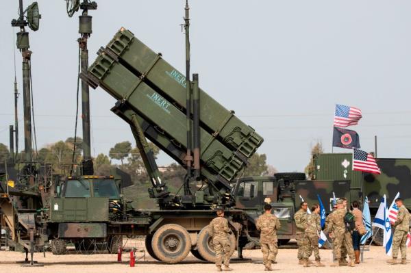 US army officers stands in front a US Patriot missile defence system during a joint Israeli-US military exercise 