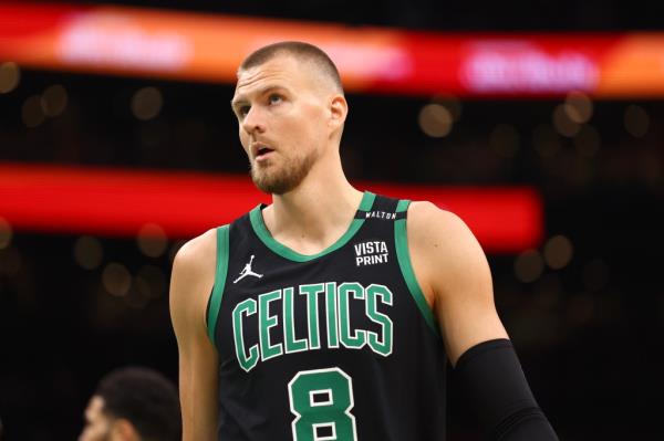 Kristaps Porzingis #8 of the Boston Celtics looks on during the first quarter against the Dallas Mavericks in Game 2 of the 2024 NBA Finals at TD Garden on June 9, 2024 in Boston, Massachusetts. NOTE TO USER: User expressly acknowledges and agrees that, by downloading and or using this photograph, User is co<em></em>nsenting to the terms and co<em></em>nditions of the Getty Images License Agreement.  