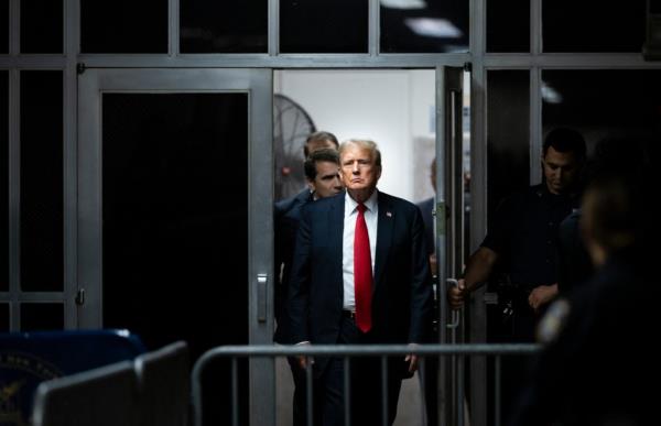 Trump exits the courtroom during a break in the trial in Manhattan Criminal Court on May 28, 2024.