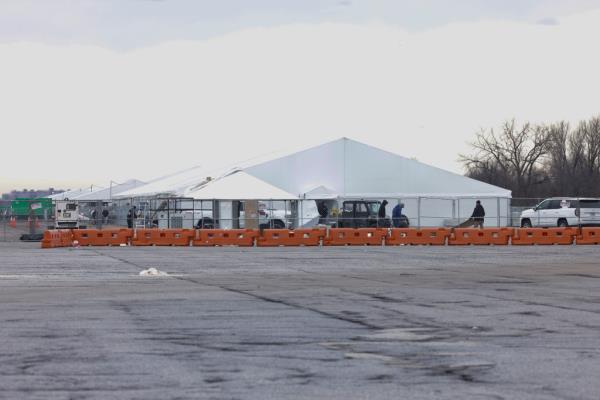 City officials are evacuating a migrant tent shelter at Floyd Bennett Field in Brooklyn due to extreme weather. 