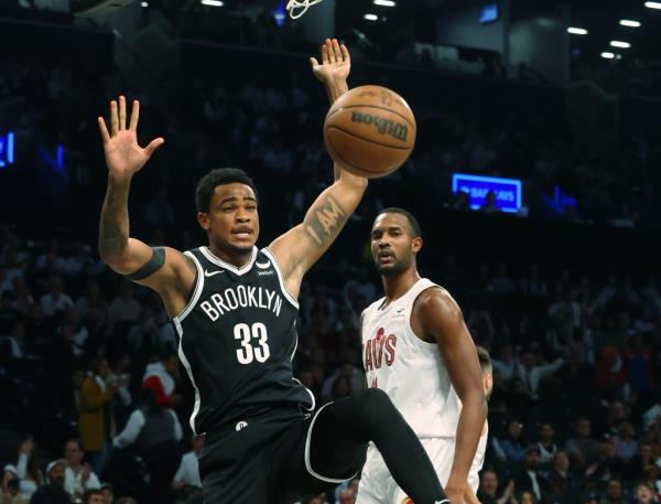 Brooklyn Nets center Nic Claxton (33) dunks during the first half when the Brooklyn Nets played the Cleveland Cavaliers