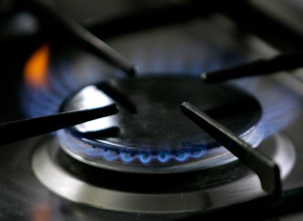 A gas-lit flame burns on a natural gas stove on Jan. 11, 2006. The Republican-co<em></em>ntrolled House is taking up legislation that GOP lawmakers say would protect gas stoves from over-zealous government regulators.