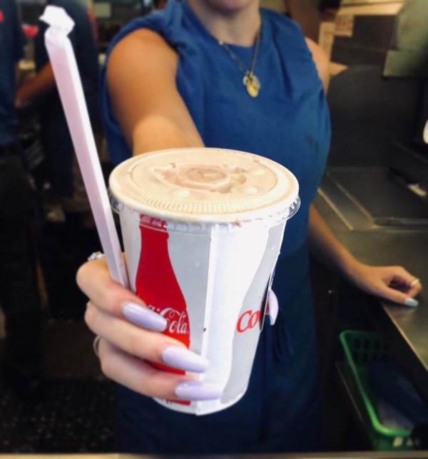 A milkshake is presented at Frugals.