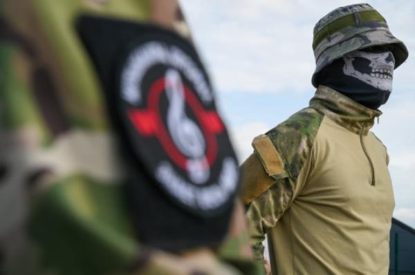 epa10817448 A man dressed in military uniform stands at an informal memorial next to the former 'PMC Wagner Centre' in St. Petersburg, Russia, 24 August 2023. An investigation was launched into the crash of an aircraft in the Tver region in Russia on 23 August 2023, the Russian Federal Air Transport Agency said in a statement. Among the passengers was Wagner chief Yevgeny Prigozhin, the agency reported. EPA/ANTON MATROSOV