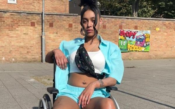 Kerry-Anne Donaldson, 26, left wheel-chair bound after 'abusing' nitrous oxide (NOS). See SWNS story SWTPnos. A woman left unable to use her legs after fueling a 'hippy crack' addiction with 600 canisters a week has backed the decision to make possession a criminal offence. Kerry-Anne Donaldson, 26, is now wheelchair-bound after 'abusing' nitrous oxide (NOS), also known as 'laughing gas', for years. The former receptionist, from Newham, East London, says she became addicted to the high. Prime Minister Rishi Sunak announced on Mo<em></em>nday (27/3) that nitrous oxide would become a class C drug, making possession illegal.