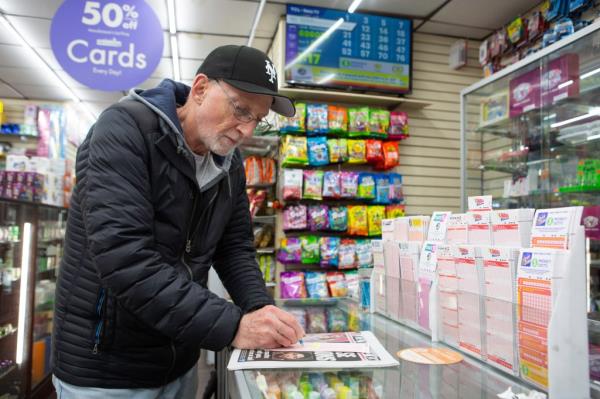 Arthur Stavola buys his Power Ball ticket at Bayside Smoke Shop on Bell Blvd in Bayside, NY.