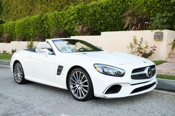 A photo of Welch's 2018 white Mercedes-Benz SL 550 convertible.