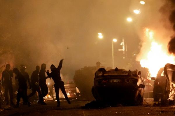 The natio<em></em>nal police on Thursday reported fires or skirmishes in multiple cities overnight, from Toulouse in the south to Lille in the north, though the nexus of tensions was Nanterre and other Paris suburbs.