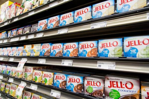 Jell-O packages in grocery stole aisle.