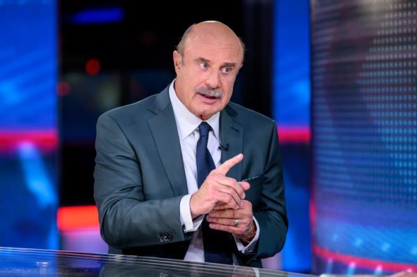 Dr. Phil in a suit at FOX News Channel Studios on Jesse Watters Primetime discussing his new book 'We've Got Issues: How You Can Stand Strong for America's Soul and Sanity'