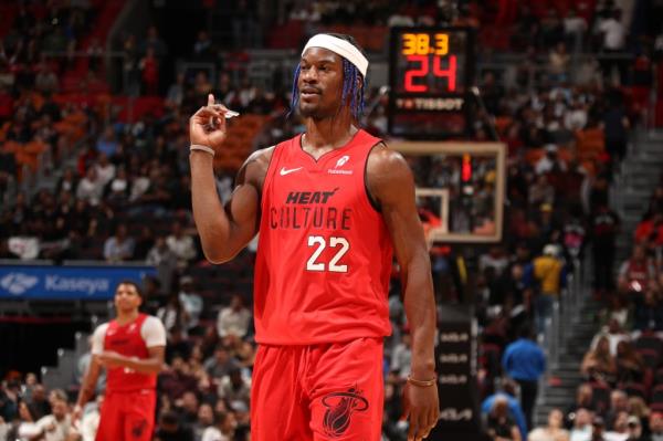 Jimmy Butler #22 of the Miami Heat looks on during the game against the Phoenix Suns on December 7, 2024 at Kaseya Center in Miami, Florida.