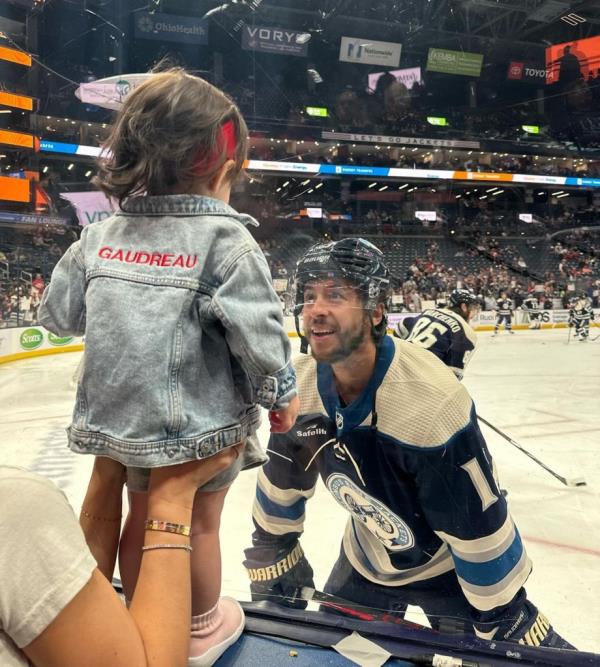 Johnny Gaudreau smiles at his daughter Noa.