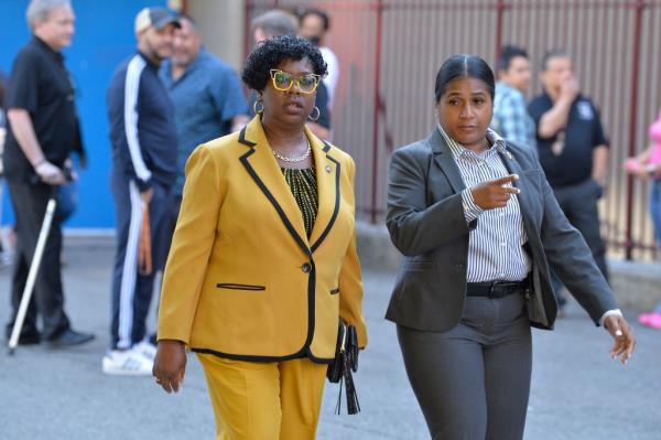 Bronx District Attorney Darcel Clark outside the school