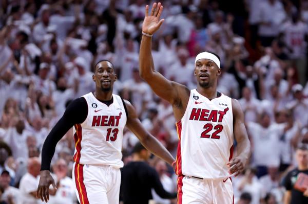 Bam Adebayo (13) and Jimmy Butler (22) of the Heat during the NBA playoffs in May 2023.