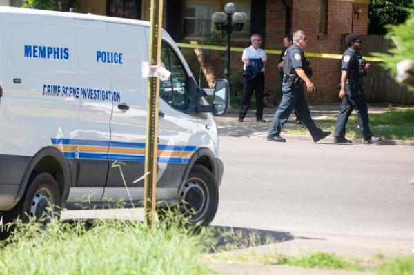 Memphis Police officers respond to a scene near the intersection of McCrory Avenue and Gary Street in Memphis, Tenn.