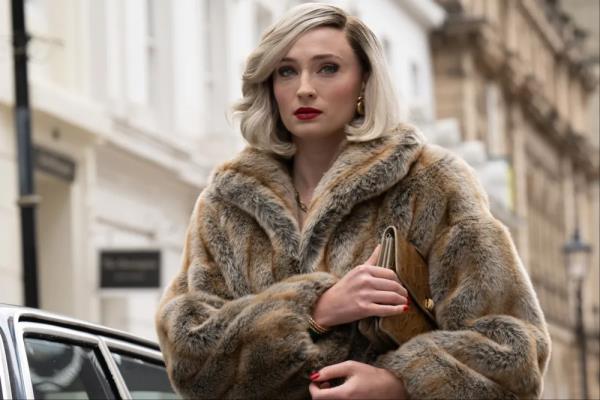 Sophie Turner in a fur coat. 