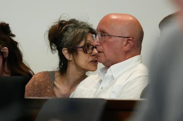 Robert E. Crimo III's mother Denise Pesina and father Robert Crimo Jr., wait before their son appears for a hearing.