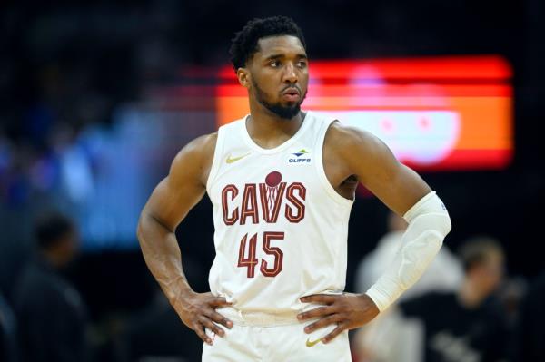 Cleveland Cavaliers guard Do<em></em>novan Mitchell standing on court during the 2024 NBA playoffs game against the Boston Celtics