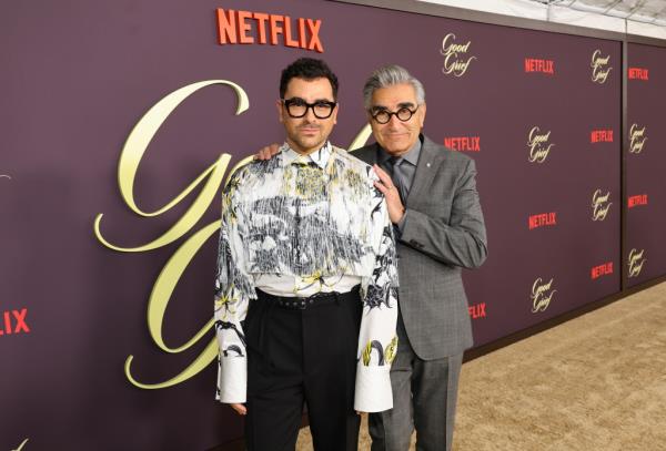 Dan and Eugene Levy smiling together. 