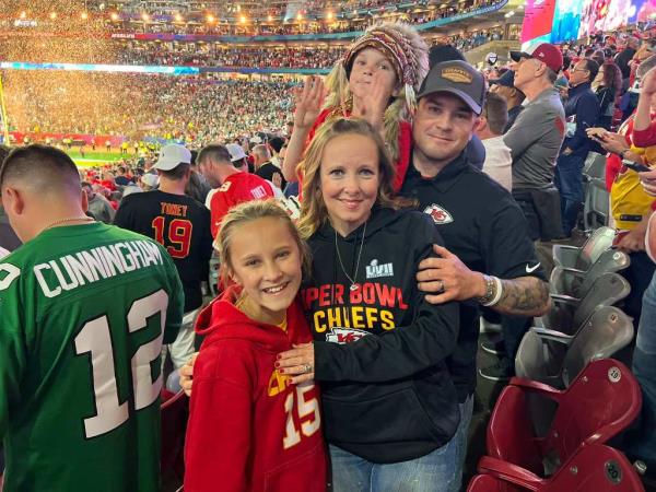 The Armenta family is pictured at a Kansas City Chiefs game.