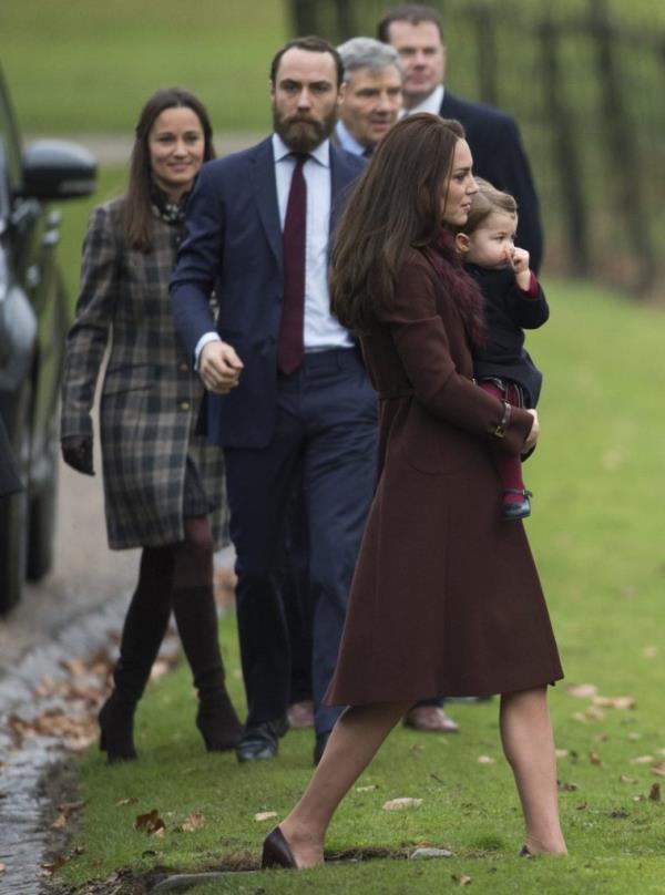 James Middleton walks with sisters Pippa Middleton and Kate Middleton.