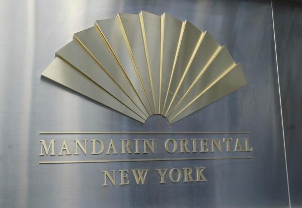 Exterior shot of Mandarin Oriental's building signage.