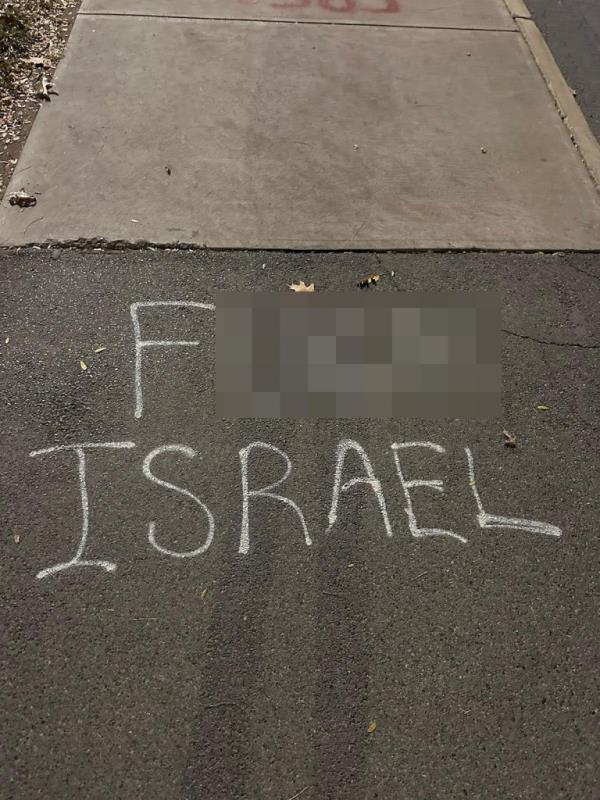 Antisemitic graffiti scrawled across the Cornell University campus.