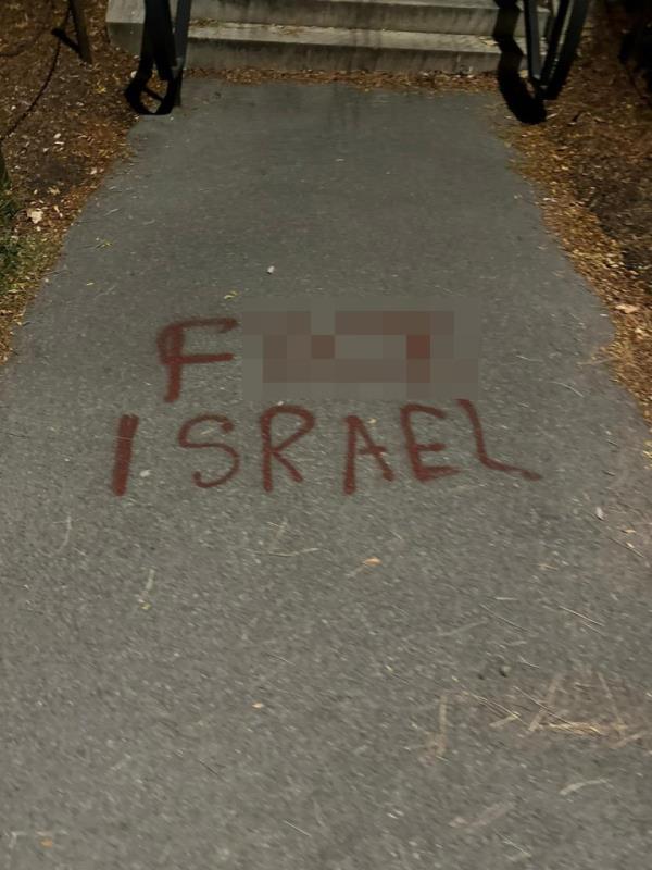 Antisemitic graffiti scrawled across the Cornell University campus.