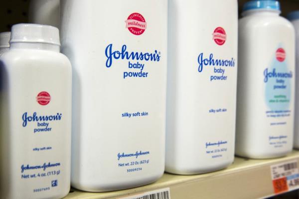 Bottles of Johnson & Johnson baby powder on a drugstore shelf in New York