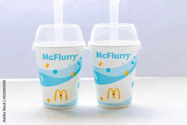 Two McDonald's McFlurry cups.