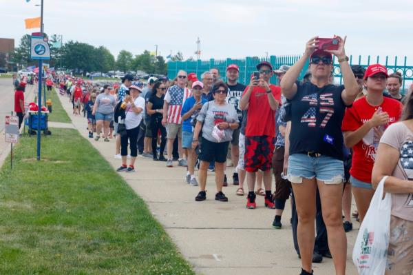 Trump waiting in line to see the Republican candidate speak.