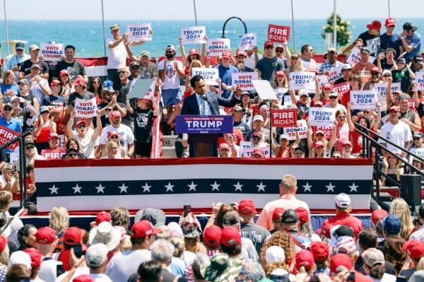 Former presidential candidate Vivek Ramaswamy speaking at the Racine rally.