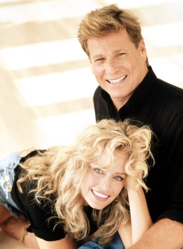 Ryan O'Neal with Farrah Fawcett. 