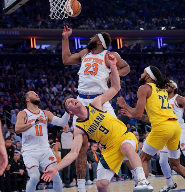 Mitchell Robinson (23), seen here during the Knicks' Game 1 win over the Pacers, is out for the rest of the NBA playoffs.