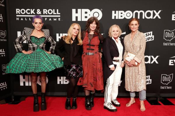 Jane Wiedlin, Charlotte Caffey, Kathy Valentine, Gina Schock and Belinda Carlisle of The Go-Go's attend the 36th Annual Rock & Roll Hall Of Fame Induction Ceremony at Rocket Mortgage Fieldhouse on October 30, 2021 in Cleveland, Ohio.