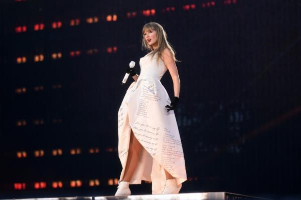 Taylor Swift performing o<em></em>nstage in a custom Vivienne Westwood ensemble during 'The Eras Tour' in Zurich, Switzerland on July 9, 2024