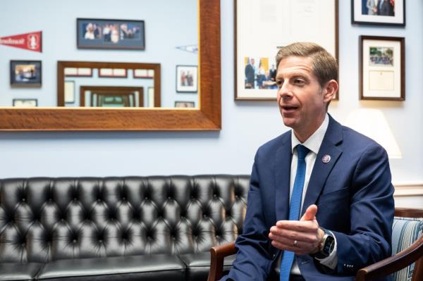 Rep. Mike Levin speaks inside his office