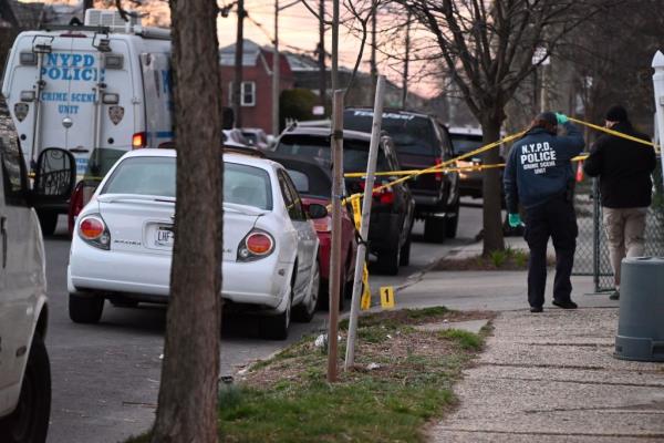 Evidence marker placed at the crime scene, Tuesday morning wher<em></em>e a 19-year-old was fatally shot in Brooklyn, New York. 