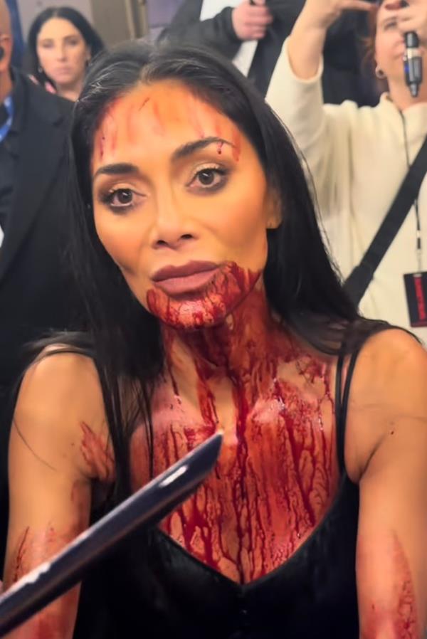 Nicole Scherzinger covered in blood