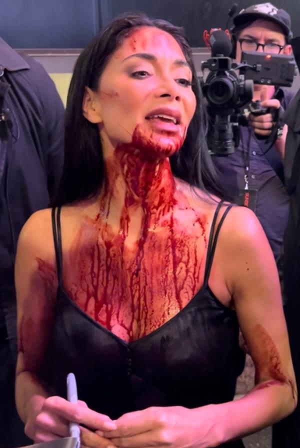 Nicole Scherzinger covered in blood