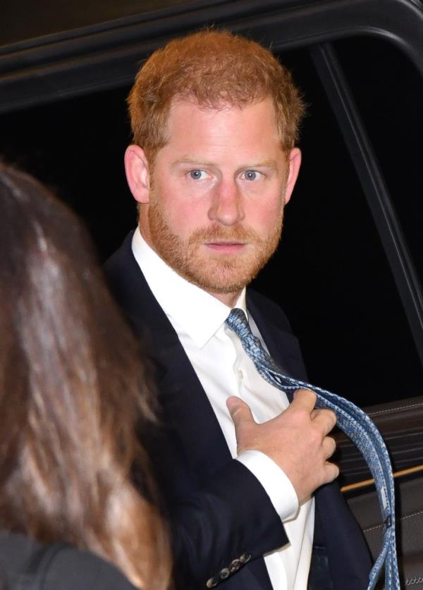 Prince Harry, Duke of Sussex, in a suit and tie, arriving at The Ziegfeld Theatre in New York City on May 16, 2023