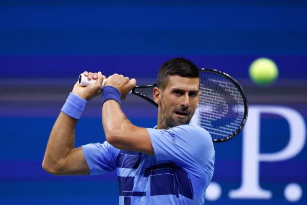 Novak Djokovic returns a shot during his US Open match on Aug. 26, 2024.