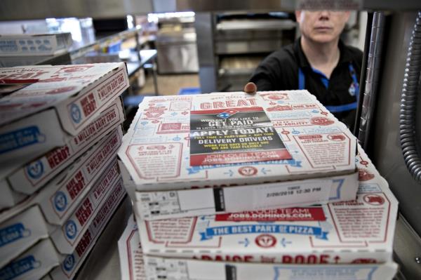 A former manager of a Domino's Pizza location in Bridgeport, Conn. is suing his ex-boss.