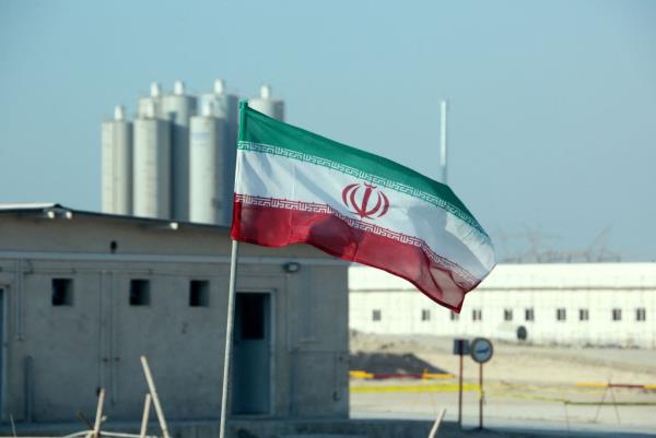 The Iranian flag flutters in front of the Internatio<em></em>nal Atomic Energy Agency (IAEA) organisation's headquarters in Vienna, Austria, June 5, 2023. 