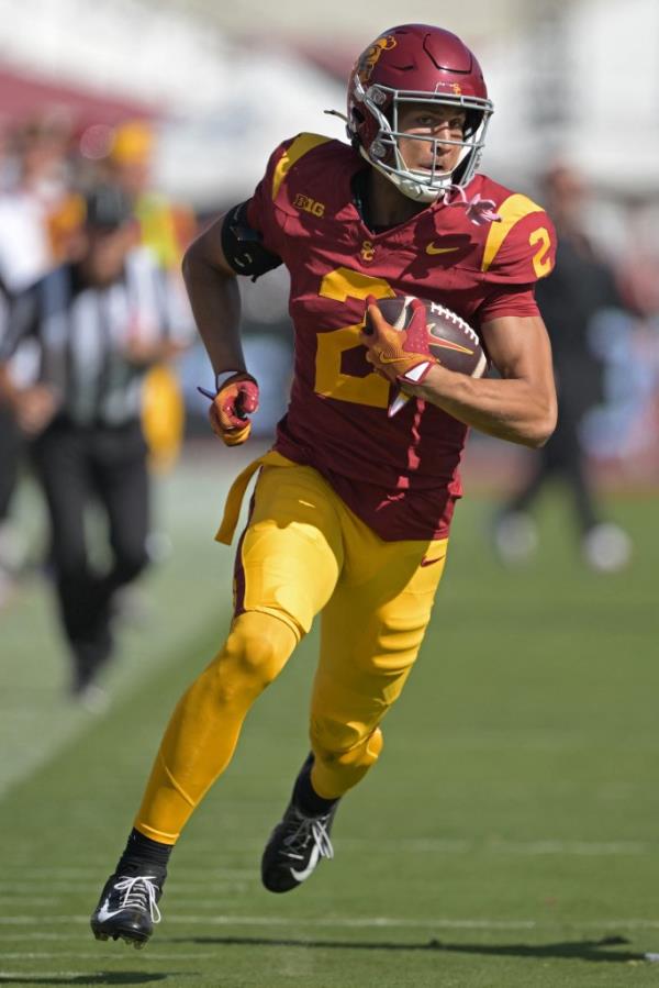 USC Trojans wide receiver Duce Robinson (2) runs the ball in the second half against the Penn State Nittany Lions at United Airlines Field at Los Angeles Memorial Coliseum. 