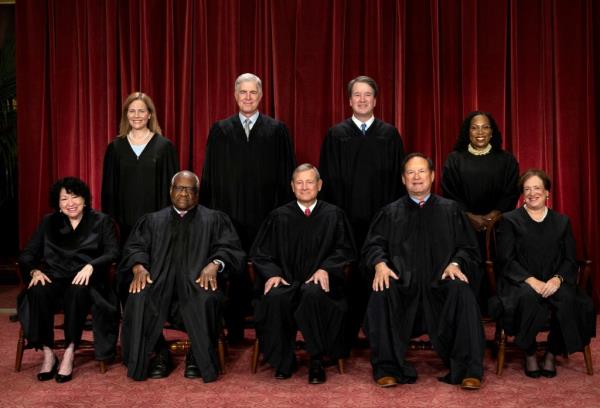 FILE PHOTO: U.S. Supreme Court justices Amy Co<em></em>ney Barrett, Neil M. Gorsuch, Brett M. Kavanaugh, Ketanji Brown Jackson, So<em></em>nia Sotomayor, Clarence Thomas, Chief Justice John G. Roberts, Jr., Samuel A. Alito, Jr. and Elena Kagan pose for their group portrait .