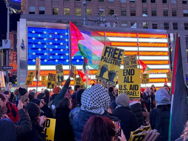 Pro-Palestine protesters are spotted walking together and holding 