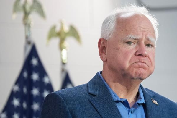 Minnesota Gov. Tim Walz appears at a campaign rally at United Auto Workers Local 900 on August 8, 2024 in Wayne, Michigan. 